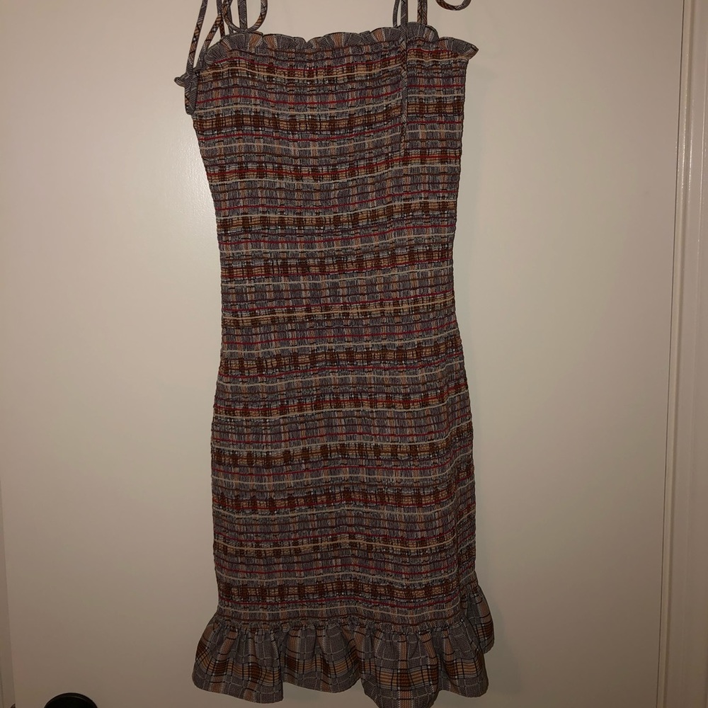 Fitted Storia ruched dress with tie straps!